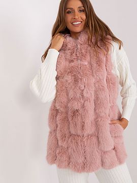 Gilet AT  This fur vest is sure to add elegance and warmth to your closet. Made of durable polyester, it provides softness and comfort for everyday we