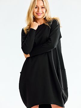 Daydress Infinite You  Sweatshirt midi dress in a looser cut with long sleeves. Pockets on the sides. Designed and sewn in Poland.