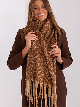 Shawl AT  This long scarf with a geometric pattern is the perfect addition to your fall and winter closet. Made of durable polyester, it is not only p
