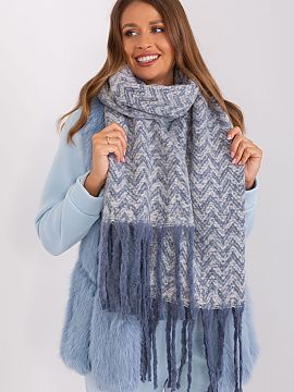 Shawl AT  This long scarf with a geometric pattern is the perfect addition to your fall and winter closet. Made of durable polyester, it is not only p