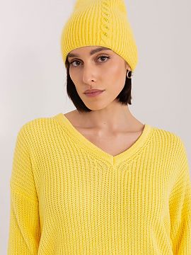 Cap AT  Winter warm hat with braided pattern. On the front an interesting application.