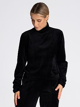Sweatshirt Figl  Blouse for women sewn from velour. It has a turtleneck and long sleeves finished with an elastic crease at the bottom.