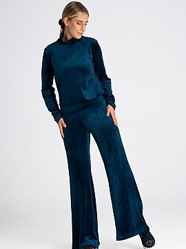Tracksuit trousers Figl  Women\'s bell-bottom pants. Made of velour with a high rise, which optically slims the waist.