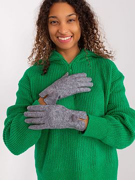 Gloves AT  Elegant women\'s gloves made of insulated material in a decorative geometric pattern. At the wrists decorative pompoms. Index finger with em