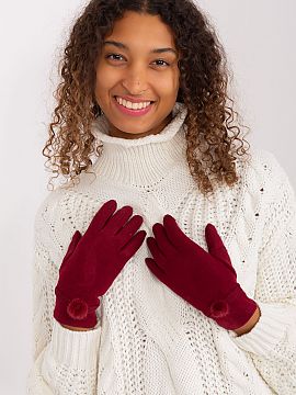 Gloves AT  Elegant knitted gloves for women in smooth fabric. At the wrists decorative pompoms. Index finger with embroidered flower, allowing to opera