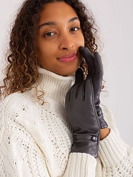 Gloves AT  Elegant women\'s gloves made from a combination of two different materials. At the wrists decorative straps with buttons. The index finger w