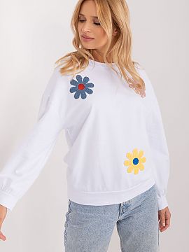 Sweatshirt Italy Moda  The casual sweatshirt with printed flowers on the front is a charming piece of clothing that combines comfort with a subtle feminine touch. 