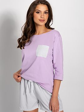 Pyjama Momenti Per Me  Women\'s pajamas consisting of a blouse and shorts. Blouse with 3/4 sleeves, with a pocket on the front. Shorts with an elastic waistband, w