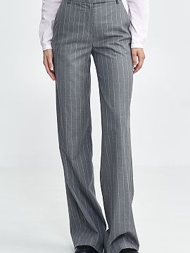 Trousers Nife  Women\'s fit pants, fitted to the silhouette, made of material with subtle, contrasting tennis-style stripes. They have a high waist that em