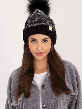 Cap Rue Paris  A winter beanie that will keep you warm and stylish. Made from a soft blend of acrylic, polyamide and wool, it guarantees comfortable wearin