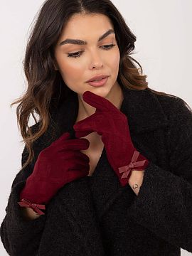 Gloves AT  Elegant women\'s gloves made of insulated material in an interesting pattern. At the wrists decorative bows. Index finger with an embroidere