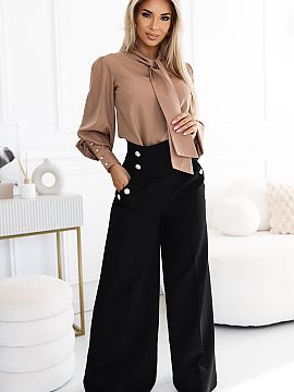 Trousers Numoco  Elegant wide-leg pants by Numoco are a classic choice ideal for formal and evening occasions. Made of smooth, matte black material, they are
