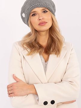 Cap AT  Charming and stylish winter hat that combines comfort and a fashionable look. Made of soft, pleasant to the touch material, it perfectly pro