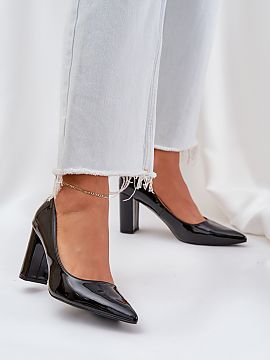 Block heel pumps Step in style  Lacquered eco-leather pumps are an elegant proposal that will add style to any outfit. Set on a block heel, they provide stability and comfo