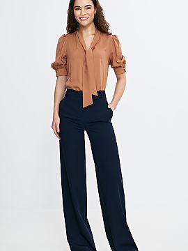 Trousers Nife  Women\'s fit trousers, tailored to the silhouette, which subtly emphasize the figure. The high waist gives them an elegant and slimming look