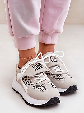 Sport Shoes Step in style  Stylish women\'s sports shoes made of eco suede. Set on a platform. The front of the shoes is decorated with rolled-up material with a print