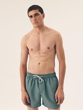 Swimming trunks Henderson  Modern men\'s swim shorts made of smooth fabric with a pattern change effect, an original accent that attracts attention. The model is equip