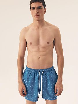 Swimming trunks Henderson  Stylish men\'s swim shorts made of lightweight material with an eye-catching print that beautifully enhances the tan. The model has side poc