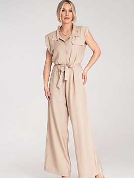 Suit Figl  Jumpsuit with wide legs, made of light and breathable material. Top fastened with buttons, with a collar and decorative flaps on the chest. 