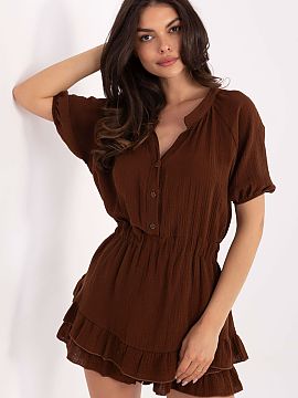 Suit Italy Moda  Light and feminine muslin jumpsuit in a dress cut is an ideal proposition for everyday wear. Made of airy, soft cotton, it ensures comfort e