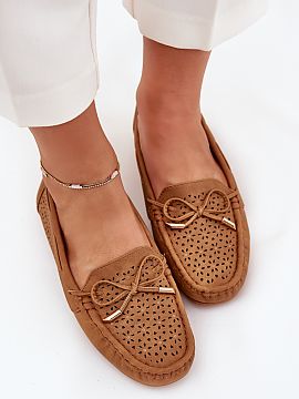Mocassin Step in style  Women\'s loafers made of eco leather, decorated with a lacy pattern, are a perfect proposal for spring and summer. At the front there is a b