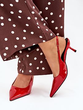High heels Step in style  Polished women\'s pumps with pointed toes and open heels are an elegant proposal that combines classic with a modern accent. Pointed toes el
