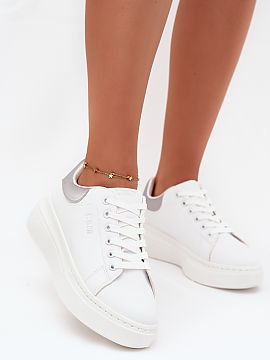 Sports footwear Step in style  Women\'s sneakers from the Big Star brand made of eco leather. Set on a platform, they provide comfort and stability, and the foam insole co