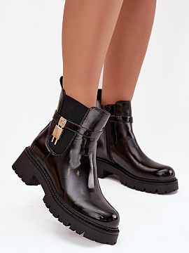 Slippers Step in style  Women\'s ankle boots made of eco-leather. Set on a platform with a flat heel, they offer stability and comfort throughout the day. Rounded t