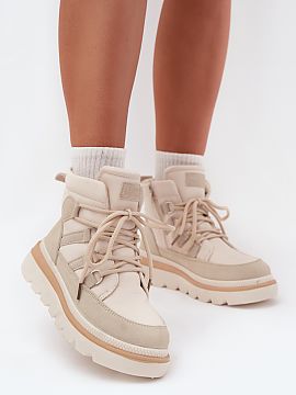 Boots Step in style  Women\'s lined ankle boots are a perfect choice for winter days. Set on a platform, they provide comfort and stability while walking. This m