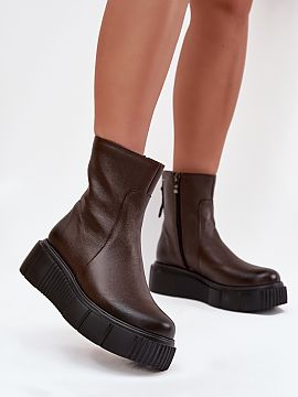 Botki Step in style  Women\'s ankle boots are made of high quality natural leather. Set on a massive platform with a delicate wedge heel. The upper is fastened w