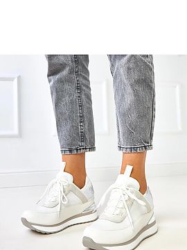 Sports footwear Solea  Modern women\'s sports shoes made of durable ecological leather that combine comfort with trendy design. The model has a round toe and class