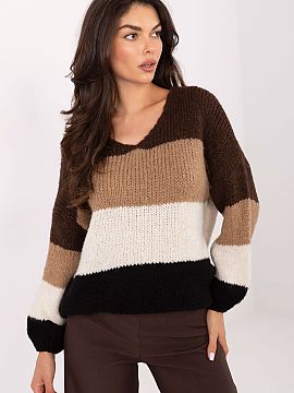 sweter Rue Paris  Oversized women\'s sweater with stripes is a fashionable proposal in a casual style, perfect for both everyday wear and work. Made of a blen