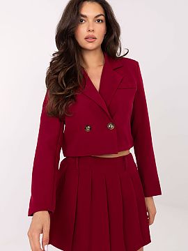 Complete Italy Moda  Women\'s elegant set consisting of a short jacket and skort, perfect for everyday outings, work, and formal meetings. The jacket has lapels,
