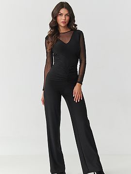 Suit Makadamia  This unique black jumpsuit for women is the quintessence of modern elegance. Designed for women who value comfort but do not want to give up