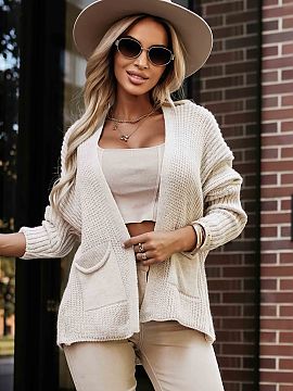 Cardigan Numoco  Universal cardigan from the Numoco Basic brand in an elegant, beige shade. Made of pleasant to the touch knitwear, it beautifully complement