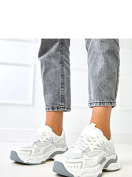 Sports footwear Solea  Sport shoes on a platform are a combination of comfort, style, and urban character. Made of high-quality synthetic leather, they look modern