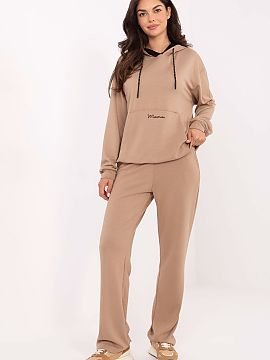 Complete Relevance  Women\'s tracksuit set consisting of a hoodie and pants in a casual style, perfect for everyday occasions. Made of exceptionally soft butter