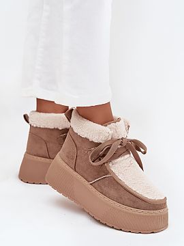 Snow boots Step in style  Women\'s snow boots made of soft eco suede are the perfect choice for winter days. A slip-on model with lacing fits perfectly to the foot, a