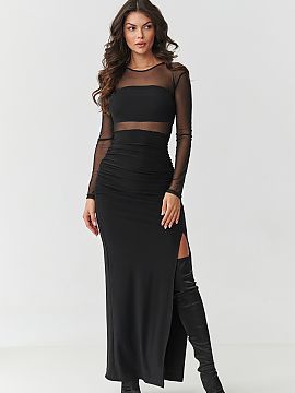 Long gown Makadamia  Enter the world of elegance that hypnotizes at first glance. This black maxi dress with mesh is a proposal for women who are not afraid to s