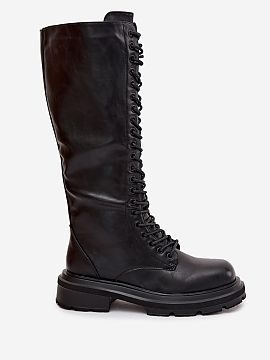 Kozaki Step in style  Ladies\' combat boots made of eco-leather are a proposal for women who appreciate bold and expressive style combined with comfort. Mounted o