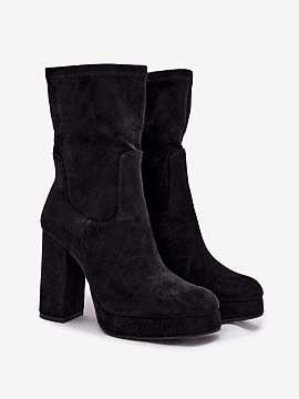 Heeled boots Step in style  Women\'s ankle boots made of soft eco suede are an elegant proposition for cooler days. Set on a high pillar heel beautifully slenderize the