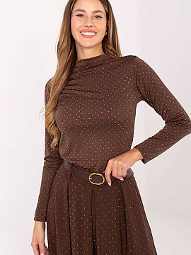 Bluzka Rue Paris  This elegant women\'s blouse is a proposal for women who appreciate style and subtle shine for every formal occasion or party. The model is 