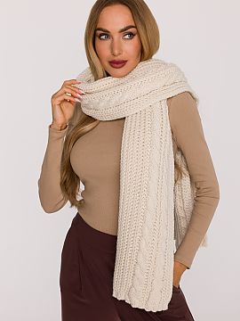 Sal Moe  A long, simple scarf made of soft thickly knitted yarn that pleasantly envelops and provides warmth on cold days. The classic braided patter