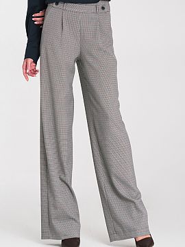 Women's pants Nife  Stylish women\'s pants with a loose relaxed fit, made of material in a non-uniform color, which adds a unique character to the whole. The mo