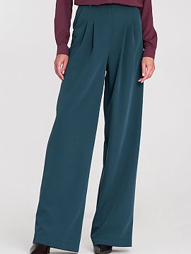 Women's pants Nife  Elegant women\'s trousers with a loose relaxed fit and high waist, which beautifully emphasize the waist and optically lengthen the legs. Th