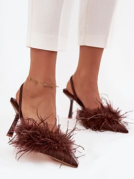 High heels Step in style  Women\'s high heels are an elegant proposition for women who appreciate style and unique details. Delicate feathers adorning the upper give 