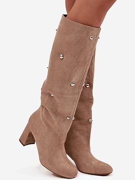 Heeled boots Step in style  Women\'s boots made of eco suede are a stylish proposal for the autumn-winter season. Set on a stable column heel, they provide comfort whil