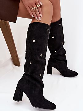 Heel boots Step in style  Women\'s boots made of eco suede are a stylish proposal for the autumn-winter season. Set on a stable pillar-shaped heel, they provide comfo