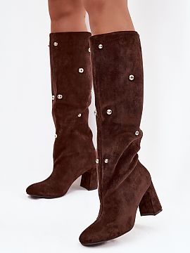 Heel boots Step in style  Women\'s boots made of faux suede are a stylish proposal for the autumn-winter season. Set on a stable column heel, they provide comfort whi