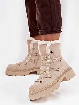 Snow boots Step in style  Women\'s snow boots made of eco suede are the perfect choice for winter days. The model, fastened with a zipper and additional lacing, ensur